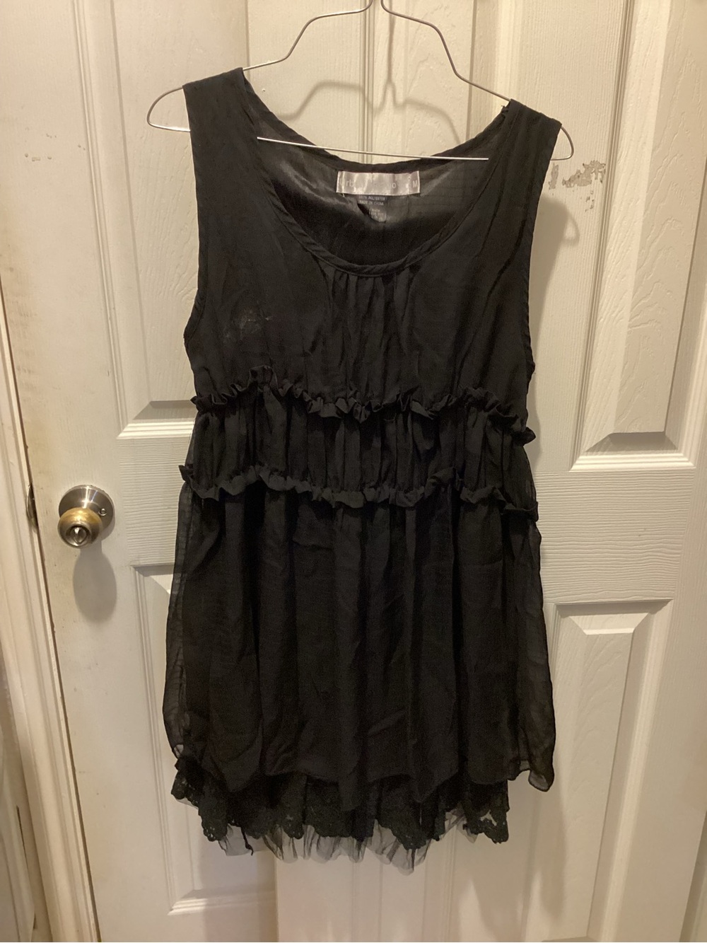 Sleeveless Black Ruffle-Detail Tunic Top